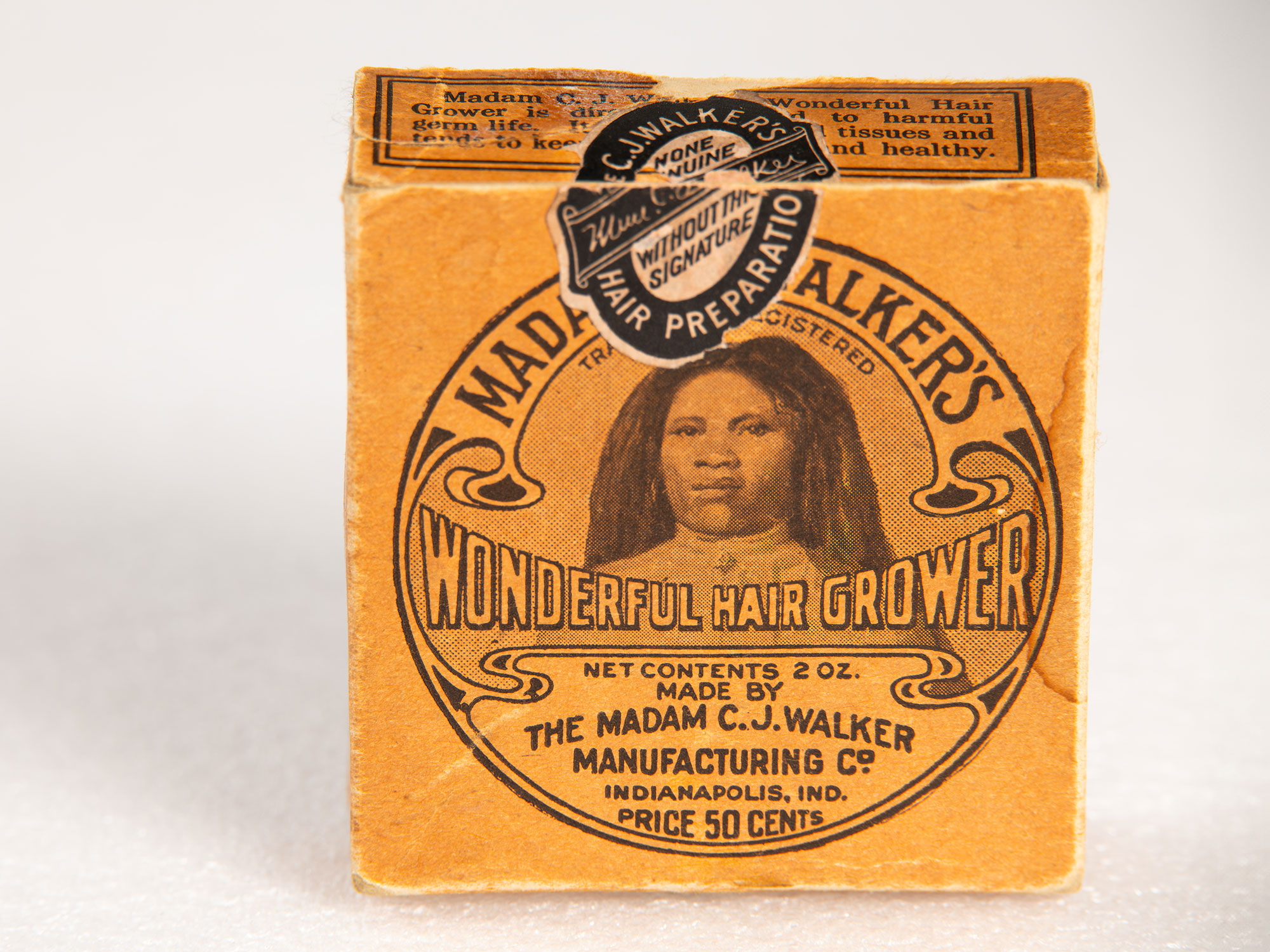 Wonder Hair Grower and Scalp Ointment tins